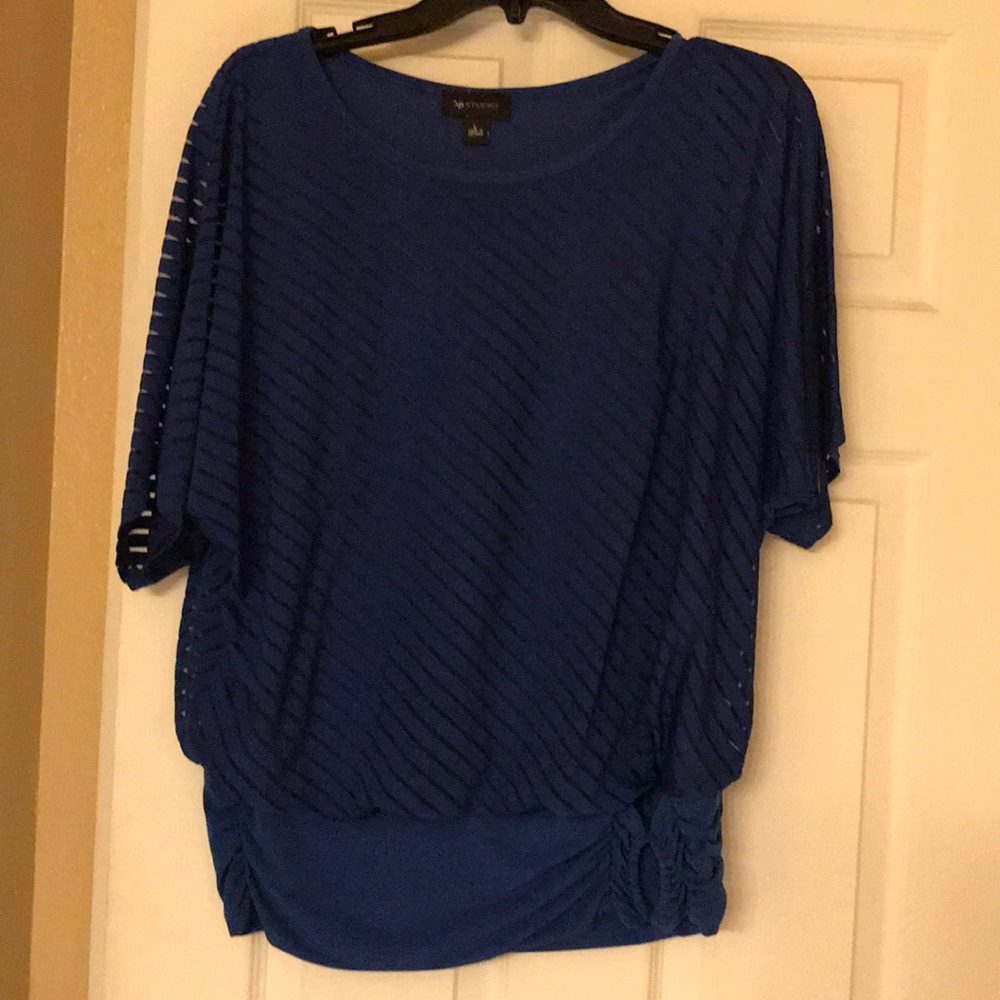 Dolman sleeve, blouson top